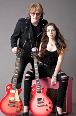 Click for larger image: Jay Jay and Samantha French with Pinkburst Project Guitars & Amp