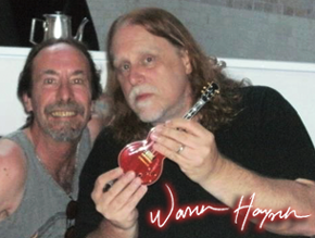 Warren Haynes Holding Licensed Miniature Guitar by AXE HEAVEN®