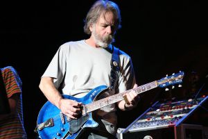 Bob Weir onstage in 2007, playing the original Modulus G3FH that inspired the AXE HEAVEN® custom promo miniature replica collectible.