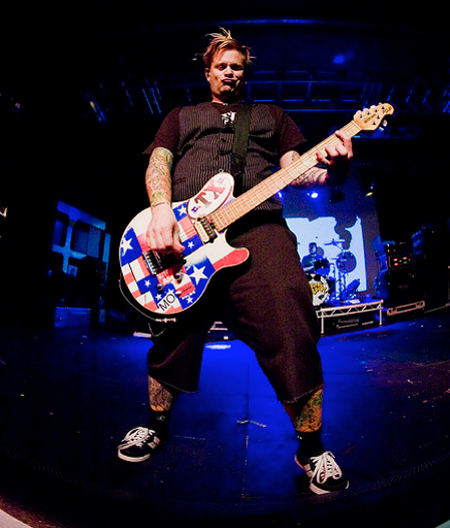 Jaret Reddick play his "Texas" Ernie Ball™ Music Man™ Axis™ Super Sport™ guitar live on a concert stage.