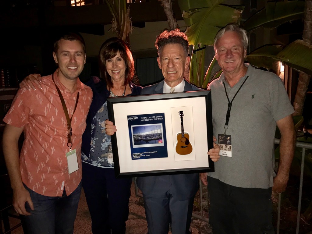 Lyle Lovett Holds His Shadowbox by Axe Heaven