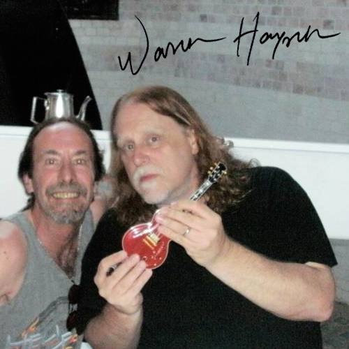 Warren Haynes holds Mini Guitar by AXE HEAVEN®